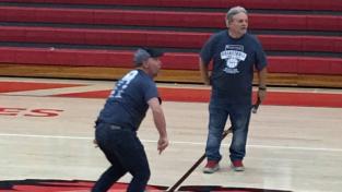 Mendez makes a half-court shot during a tournament to benefit a the Boys Shelter in Fort Smith, Arkansas.